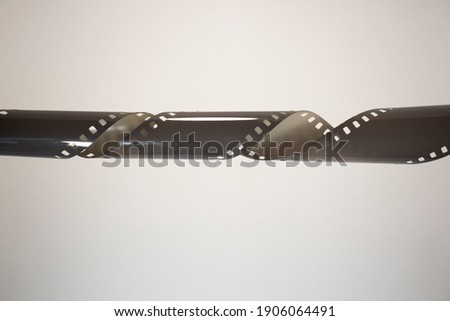 old photographic film on white isolated background with copy space
