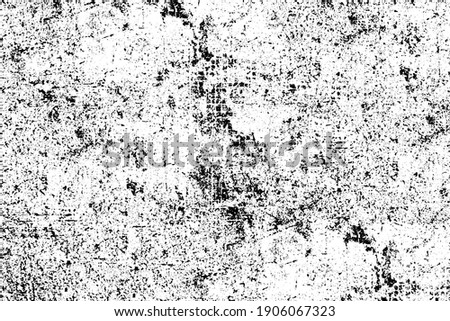 Grunge background black and white. Texture of chips, cracks, scratches, scuffs, dust, dirt. Dark monochrome surface. Old vintage vector pattern	 Royalty-Free Stock Photo #1906067323