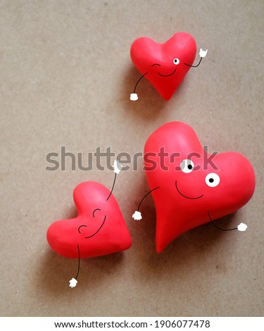 Happy valentine day. Red heart on brown background.
