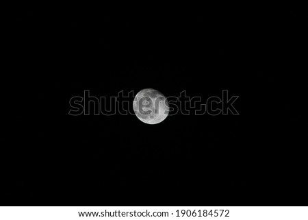 A beautiful picture of the moon at night.