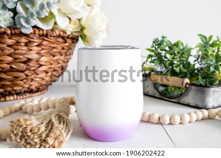Blank purple and white gradient insulated wine tumbler with rustic decor, drinkware mockup