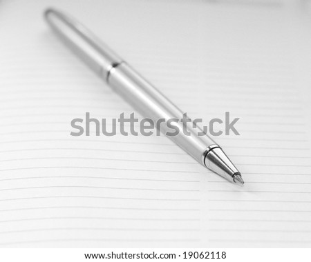 Pen on a paper sheet