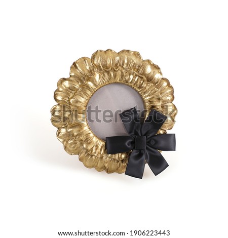 Golden round frame with black mourning ribbon for paintings, mirrors or photo isolated on white background. Design element with clipping path