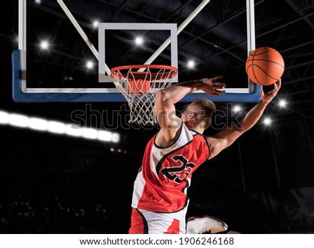 Basketball player players in action. Basketball concept on black background