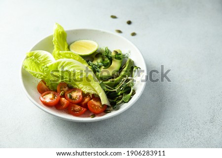 Healthy salad ingredients on a plate