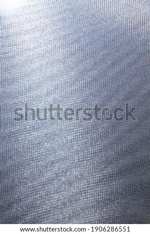 abstract colored wavy background of interference overlay fine meshes, combination of light and shadow, toning