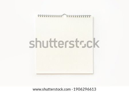 Blank wall calendar background on white.
