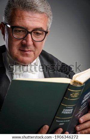 Italy, middle age lawyer studio portrait