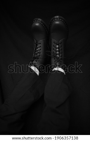 Black leather shoes close up black and white photo.