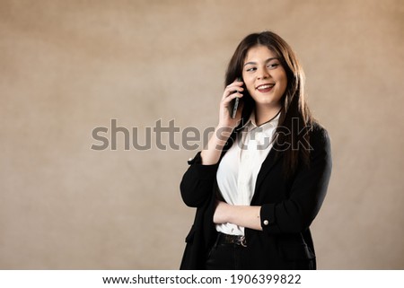 young beautifull girl calling and using a smartphone