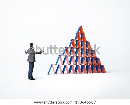 Businessman and the house of cards