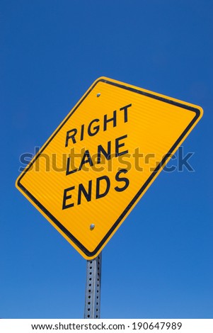 The "Right lane ends" sign in the Southern Californian sun.