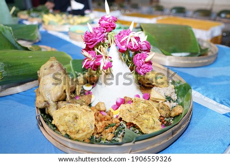 "Nasi Tumpeng and Ingkung" is a traditional Javanese, Indonesian food