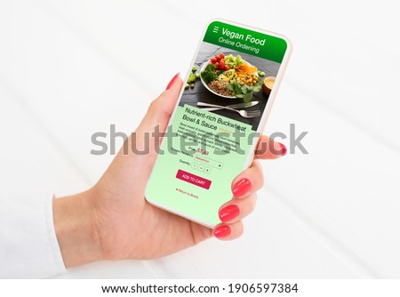 Woman ordering vegan food online