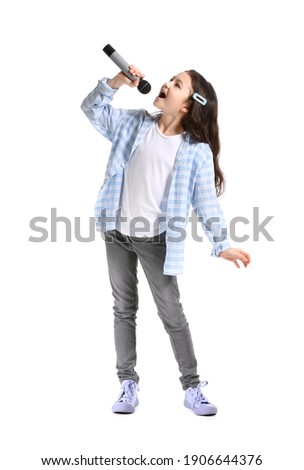 Cute little girl singing against white background Royalty-Free Stock Photo #1906644376