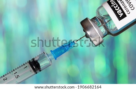 Coronavirus 2019-nCoV vaccine with syringe close up, medical concept, vaccination, injection,Disease prevention, immunization.