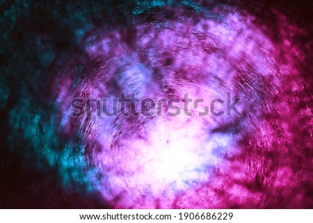 Beautiful abstract texture circle in colorful light. Background pattern for design. Macro photography view.