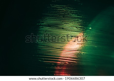 Beautiful abstract surreal brush smear green light pastel dark magic. Background pattern for design. Macro photography view.