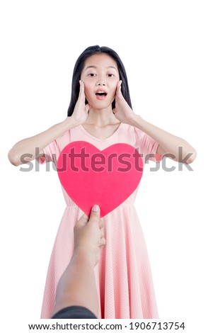Asian woman receive red hearts isolated over white background