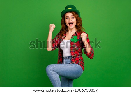Portrait of her she nice-looking attractive pretty lovely glad cheerful cheery wavy-haired girl dancing having fun festive isolated over bright vivid shine vibrant green color background