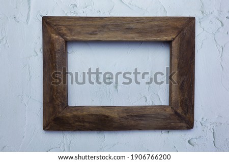 Wood frame or photo frame on the wall.