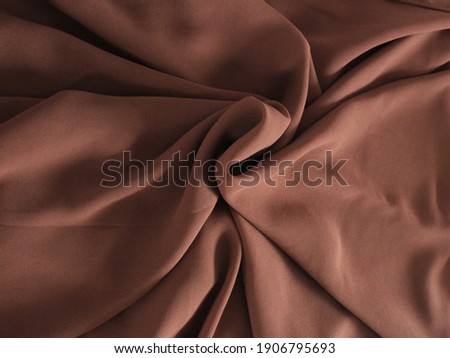 harmonious folds of pashmina brown fabric