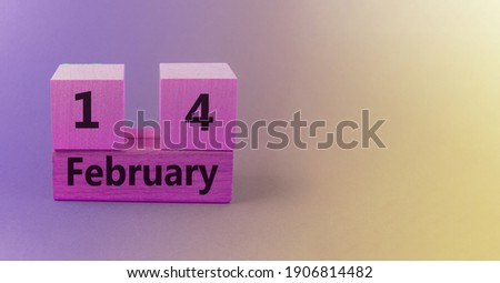 Gradient light purple pink background with wooden block calendar with date February 14 with copy space and space for your text.