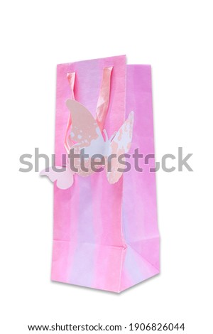 Pink paper shopping bag selected on white background.
Butterfly card decoration on pink shopping bag.
Pink shopping bag, paper bag, Sale