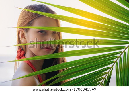 Close up of happiness woman freedom vacation relax on the beach enjoy with warm light.