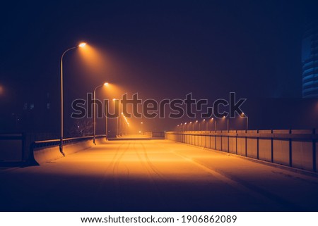 Street at night after snow in winter Royalty-Free Stock Photo #1906862089