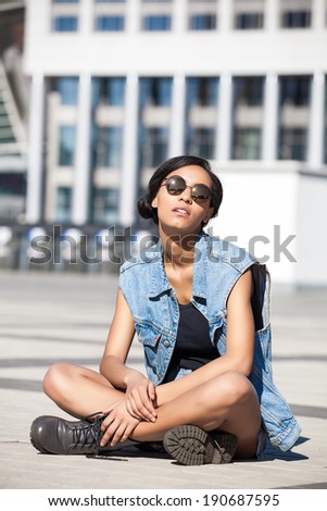 Portrait happy young brunette woman posing outdoor