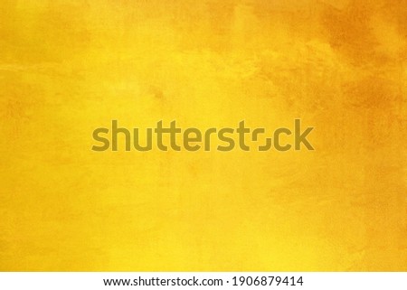 Gold background or texture and gradients shadow. gold polished metal steel texture abstract background. Royalty-Free Stock Photo #1906879414