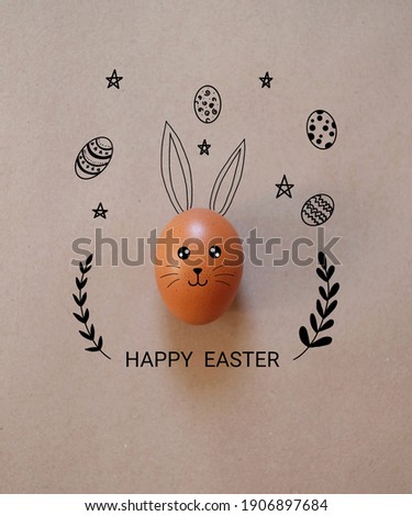 Happy  Easter day.Eaeter egg on brown background.