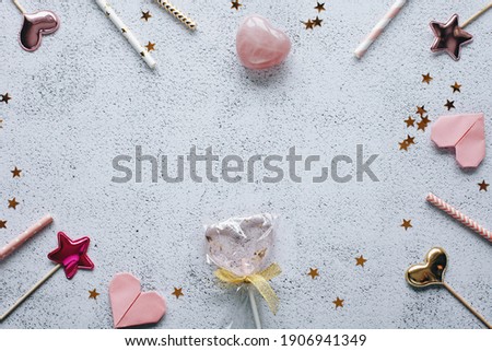 Flat lay Happy Valentine's Day photography with gift box and paper origami heart on wooden background. Romantic greeting card. 