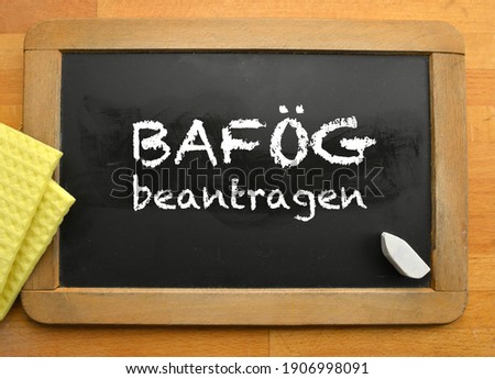 Student loan blackboard in German: Bafoeg Royalty-Free Stock Photo #1906998091