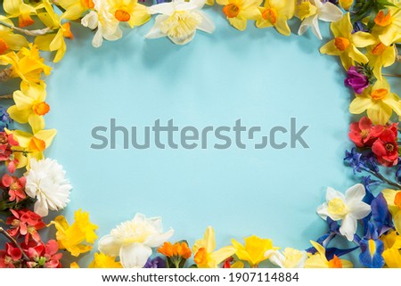 Spring floral arrangement on blue background