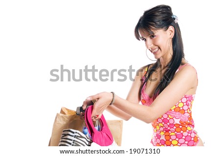 Young brunette girl with shopping-bags, isolated on white background