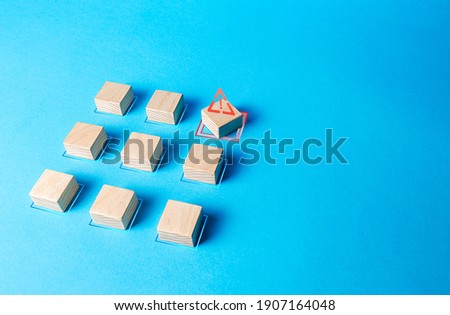 One of the blocks breaks the formation. Violation of order, malfunction failure. Deviation from the norm. Determination and correction of the error. Disorder process. Discipline staggered Royalty-Free Stock Photo #1907164048