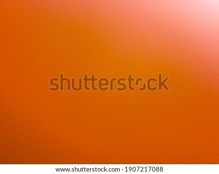 Vintage background in bright orange color.