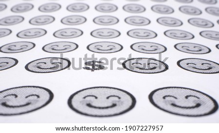 background from smiles. icons with smiling faces on a sheet of paper. mood concept. extreme close-up. detailed