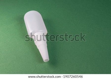 Glue bottle on the colorful background