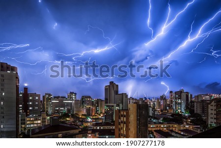 Thunder Storm with Various Lightnings Strikes In the Night Sky and the Buildings of Belo Horizonte, Minas Gerais, Brazil
