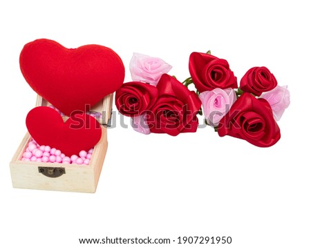 gift box with a red heart and rose on  table. Valentine day.