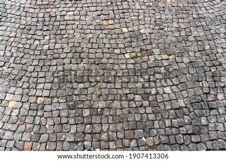 Gray stone paving slabs, stone background, paving stone pattern 
