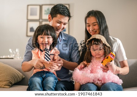 Portrait of parents happy full family with children have fun sitting on sofa in living room leisure activities spend time at home.Weekend activity happy family lifestyle concept.