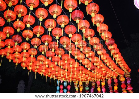 Festive happy Chinese new year concept. Decorative red lamp oriental in night at Chinatown background. 