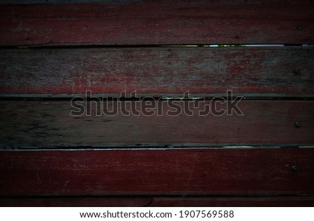 Old old red wood photos Has a beautiful texture , Wooden background , Copy space               