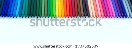Banner with set of colored felt-tip pens on white background. Directly Above View. Flat lay. Space for text