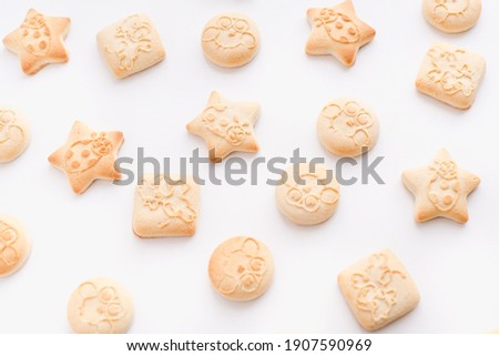 baby cookies on white background, curly cookies 