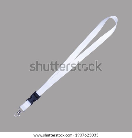 white Lanyard Neck Strap  with Metal Lobster Clip and Safety Breakaway Clasp-Isolated on grey background Royalty-Free Stock Photo #1907623033
